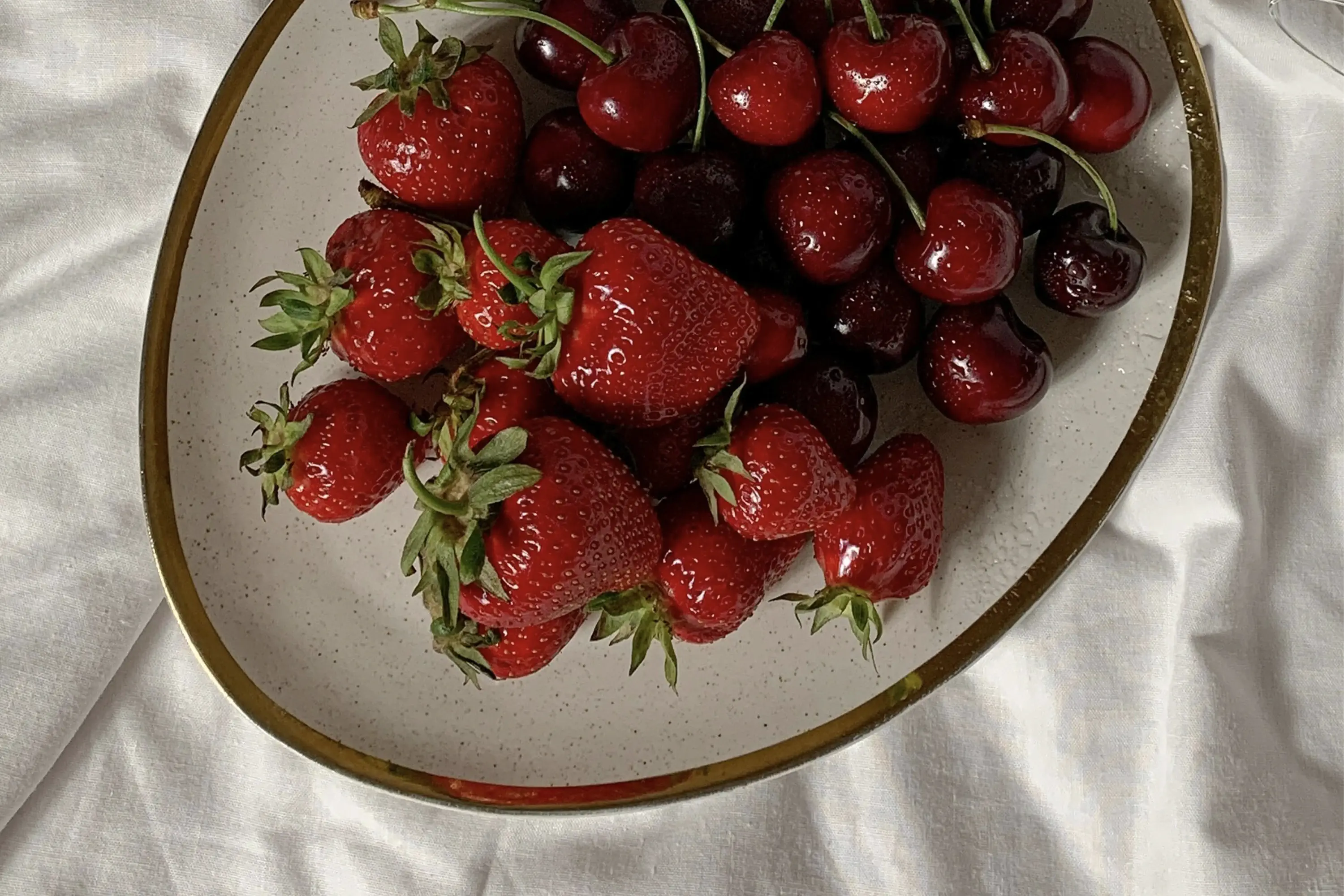 bowl of strawberries and cherries